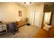 Home office with desk, chair, and built in closet at 1025 Copper Creek Dr, Canton, GA 30114
