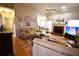 Living room with a fireplace, seating area and hardwood floors at 1025 Copper Creek Dr, Canton, GA 30114