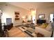 Spacious living room with comfortable seating and a fireplace at 1025 Copper Creek Dr, Canton, GA 30114