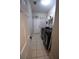 Laundry room with washer, dryer, and extra storage at 1025 Copper Creek Dr, Canton, GA 30114