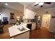 Spacious kitchen with island, stainless steel appliances, and white cabinets at 1025 Copper Creek Dr, Canton, GA 30114