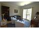 Cozy sitting area with comfortable chairs and a blue rug at 1025 Copper Creek Dr, Canton, GA 30114