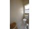 Clean bathroom features a toilet, sink, and tiled floor at 1025 Copper Creek Dr, Canton, GA 30114
