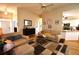 Open concept living room with a view of the kitchen at 1025 Copper Creek Dr, Canton, GA 30114