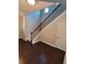 Modern staircase with dark wood and metal railing at 368 Sawyer Meadow Way, Grayson, GA 30017