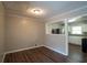 Dining room with hardwood floors and kitchen access at 2308 Sheryl Dr, Decatur, GA 30032