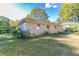 Large backyard with patio and partial fence at 2308 Sheryl Dr, Decatur, GA 30032