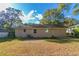 Spacious backyard with patio and mature trees at 2308 Sheryl Dr, Decatur, GA 30032