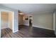Spacious living room with hardwood floors and views into kitchen at 2308 Sheryl Dr, Decatur, GA 30032