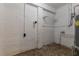 Laundry room with white brick walls and tile flooring at 2308 Sheryl Dr, Decatur, GA 30032