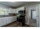 Updated kitchen with stainless steel appliances at 2308 Sheryl Dr, Decatur, GA 30032