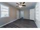 Charming bedroom with wood-look floors and brick accent wall at 2308 Sheryl Dr, Decatur, GA 30032