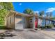 House with red door and carport at 2308 Sheryl Dr, Decatur, GA 30032