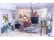 Living room with fireplace and access to backyard at 1563 Poplarwood Nw Ln, Lawrenceville, GA 30043