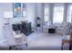 Relaxing living room with two armchairs and bay window at 1563 Poplarwood Nw Ln, Lawrenceville, GA 30043