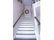 Modern staircase with black and white accents at 1563 Poplarwood Nw Ln, Lawrenceville, GA 30043
