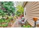 Brick patio with seating area nestled in a private backyard setting at 1563 Poplarwood Nw Ln, Lawrenceville, GA 30043