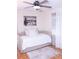 Bedroom with a daybed and ceiling fan at 1563 Poplarwood Nw Ln, Lawrenceville, GA 30043