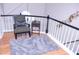 Spacious landing with seating area and hardwood floors at 1563 Poplarwood Nw Ln, Lawrenceville, GA 30043