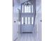 Bright entryway with tiled floor, white doors, and large window at 1563 Poplarwood Nw Ln, Lawrenceville, GA 30043