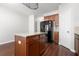 Kitchen with island, granite countertops and wood cabinets at 3034 Liberty Nw Way, Atlanta, GA 30318