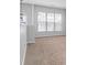 Spacious living room with large windows at 3034 Liberty Nw Way, Atlanta, GA 30318
