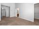Bright bedroom with carpeted floor and walk-in closet at 3034 Liberty Nw Way, Atlanta, GA 30318