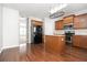 Kitchen with island, stainless steel appliances, and wood cabinets at 3034 Liberty Nw Way, Atlanta, GA 30318