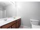 Bathroom with double vanity and a toilet at 3034 Liberty Nw Way, Atlanta, GA 30318