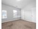 Spacious bedroom with neutral decor and ample closet space at 3034 Liberty Nw Way, Atlanta, GA 30318