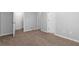 Empty hallway with carpet flooring and access to other rooms at 3034 Liberty Nw Way, Atlanta, GA 30318