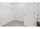 Walk-in closet with wire shelving; great for storage at 385 Riverwood Pass, Dallas, GA 30157