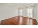 Formal dining room showcasing hardwood floors and a chandelier at 11334 Gates Ter, Duluth, GA 30097