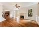 Bright living room, hardwood floors, fireplace, and deck access at 105 Windsor Cv, Atlanta, GA 30328