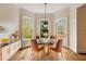 Bright breakfast nook with hardwood floors and access to backyard at 105 Windsor Cv, Atlanta, GA 30328