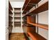 Large walk-in closet with custom shelving and drawers at 105 Windsor Cv, Atlanta, GA 30328