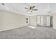 Spacious main bedroom with ceiling fan and carpet at 5401 Stone Cove Sw Dr, Atlanta, GA 30331
