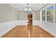 Bright dining room with hardwood floors and chandelier at 5401 Stone Cove Sw Dr, Atlanta, GA 30331
