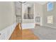 Spacious living room with hardwood floors and high ceilings at 5401 Stone Cove Sw Dr, Atlanta, GA 30331