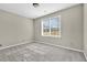 Spacious bedroom with neutral walls and carpet at 5401 Stone Cove Sw Dr, Atlanta, GA 30331