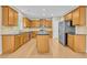 Spacious kitchen with island and stainless steel appliances at 5401 Stone Cove Sw Dr, Atlanta, GA 30331
