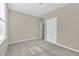 Bright bedroom with large window and neutral decor at 5401 Stone Cove Sw Dr, Atlanta, GA 30331