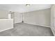 Loft bedroom with grey carpet and natural light at 5401 Stone Cove Sw Dr, Atlanta, GA 30331