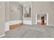 Two-story foyer with chandelier, hardwood floors, and views to the kitchen at 5401 Stone Cove Sw Dr, Atlanta, GA 30331