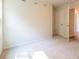 Well-lit bedroom featuring carpet and ample wall space at 134 Henley St, Canton, GA 30114