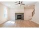 Living room fireplace with a gray stone surround at 134 Henley St, Canton, GA 30114