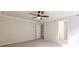 Bright bedroom with carpeted floors and ceiling fan at 134 Henley St, Canton, GA 30114