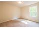 Spacious bedroom with neutral walls and carpet flooring at 134 Henley St, Canton, GA 30114