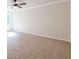 Bedroom with carpeted floors and ceiling fan at 134 Henley St, Canton, GA 30114