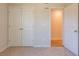 Bedroom with double door closet and access to hallway at 134 Henley St, Canton, GA 30114